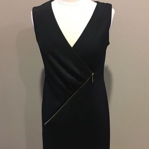 Black mock wrap dress with gold zipper detail